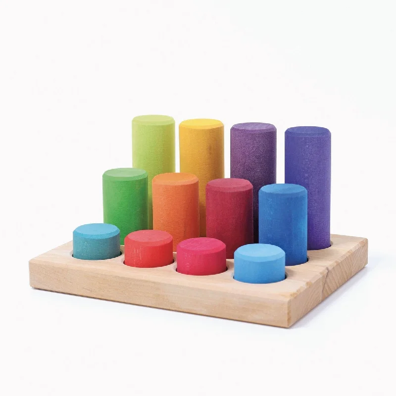 sustainably sourced wooden toys                   Grimm's rainbow stacking game small rollers