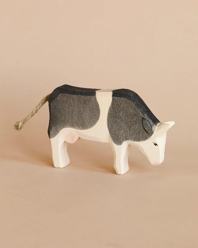 robust and engaging wooden toys for kids                   Ostheimer Cow - Black & White - Eating