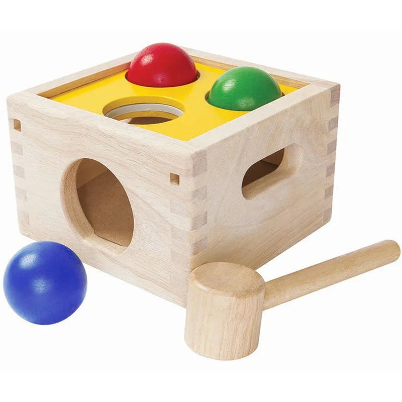 playful wooden toys                  Plan Toys punch & drop pounding set